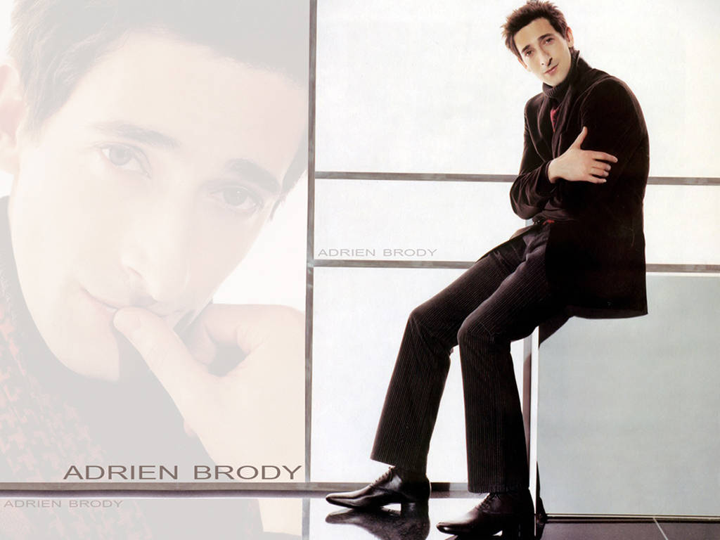 Award-winning actor Adrien Brody looking suave and contemplative Wallpaper