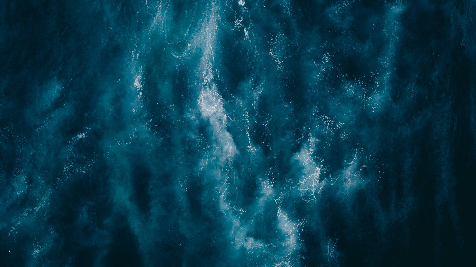 Mystique of the Navy Blue Ocean from Above Wallpaper