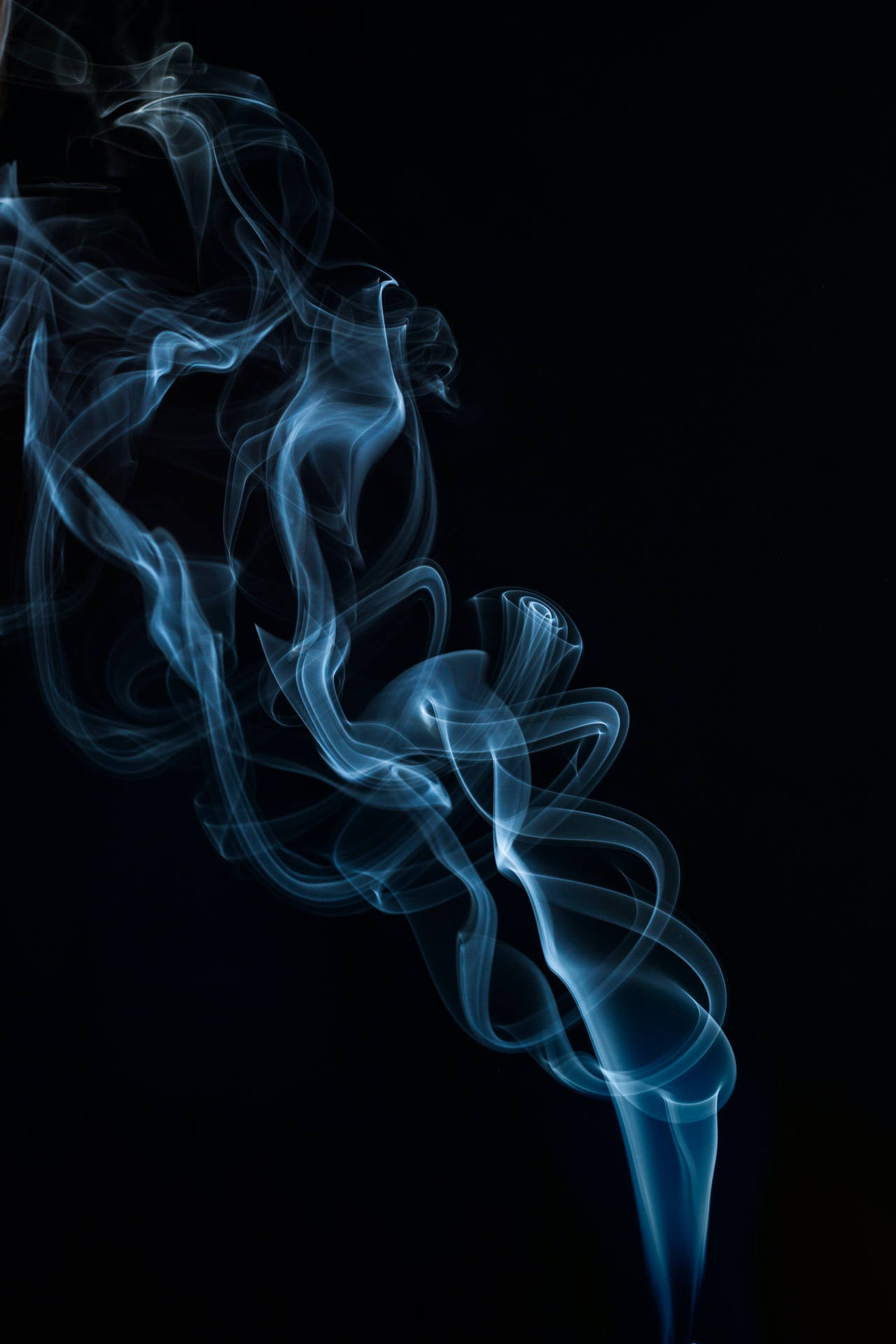 A close up of a bright blue Android smoky vapor Wallpaper