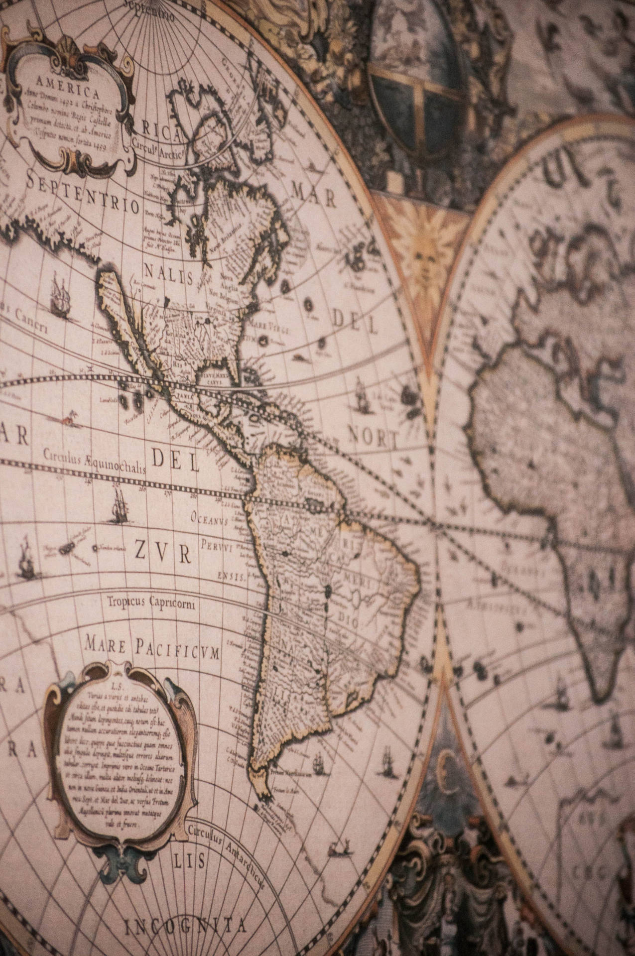 "Explore the world with our Antique World Map Mural." Wallpaper