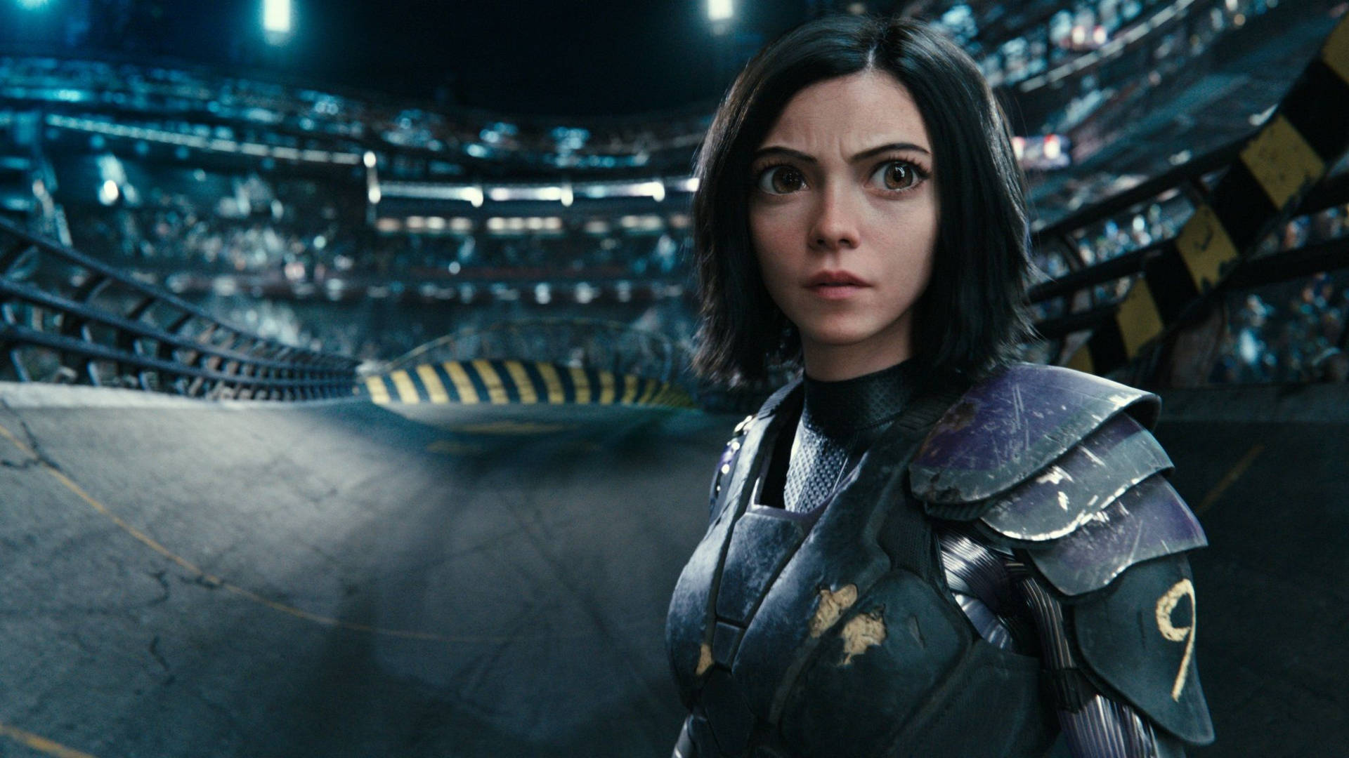 Ready for battle, Alita takes the fight to the streets in her advanced armor Wallpaper