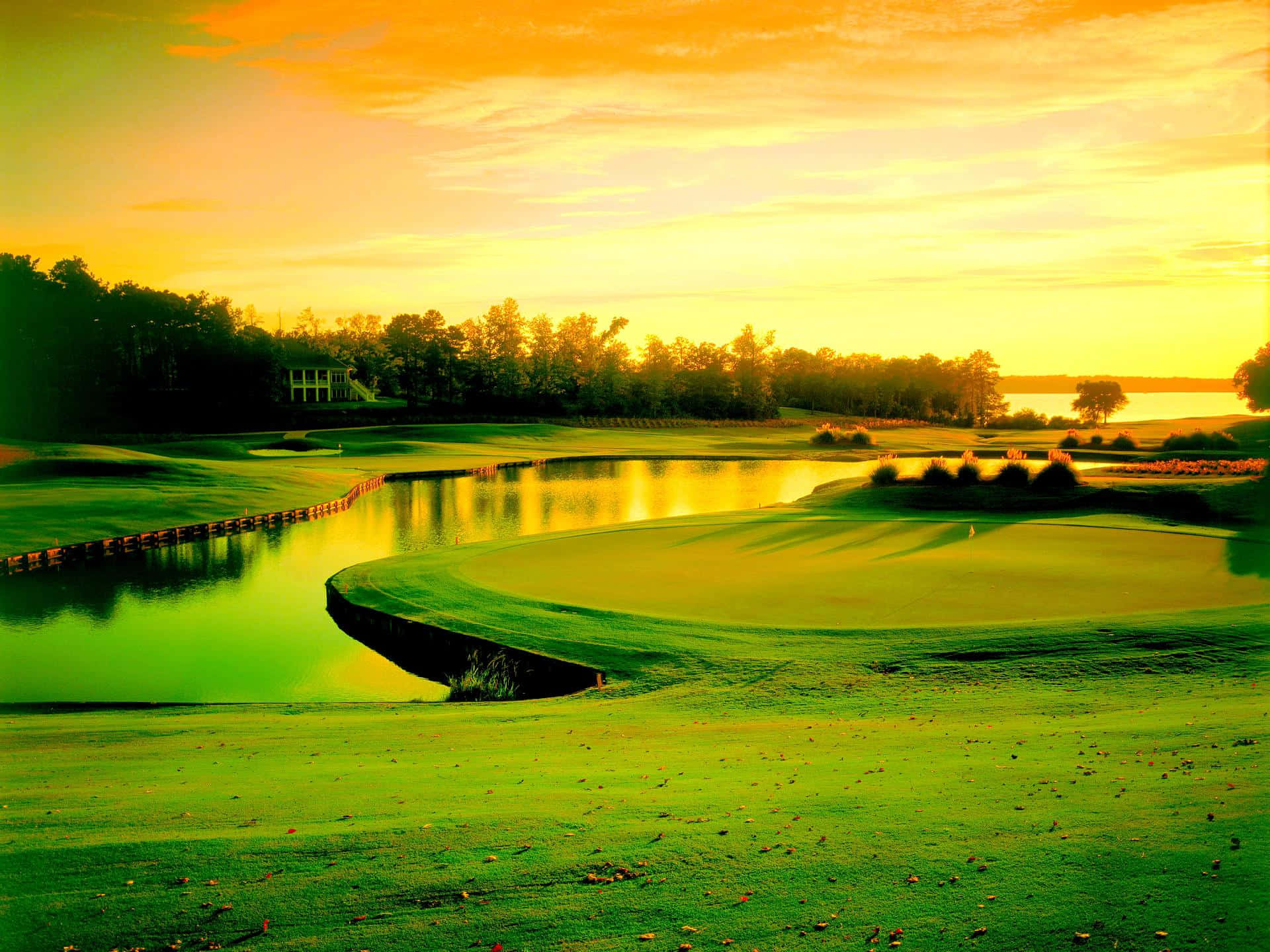 Electrifying view of a golf course at sunset Wallpaper