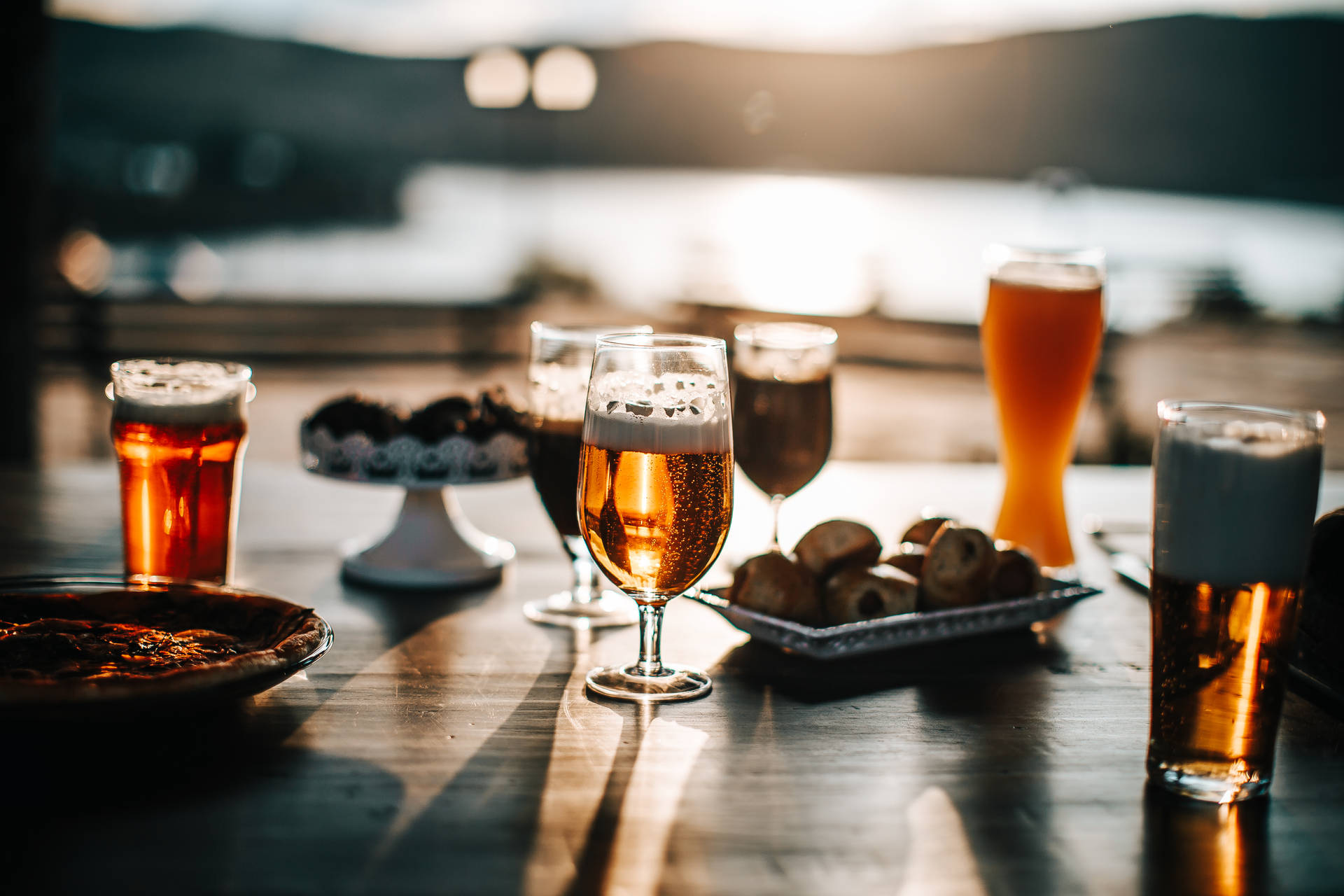 Enjoy a beer while watching the sun set. Wallpaper