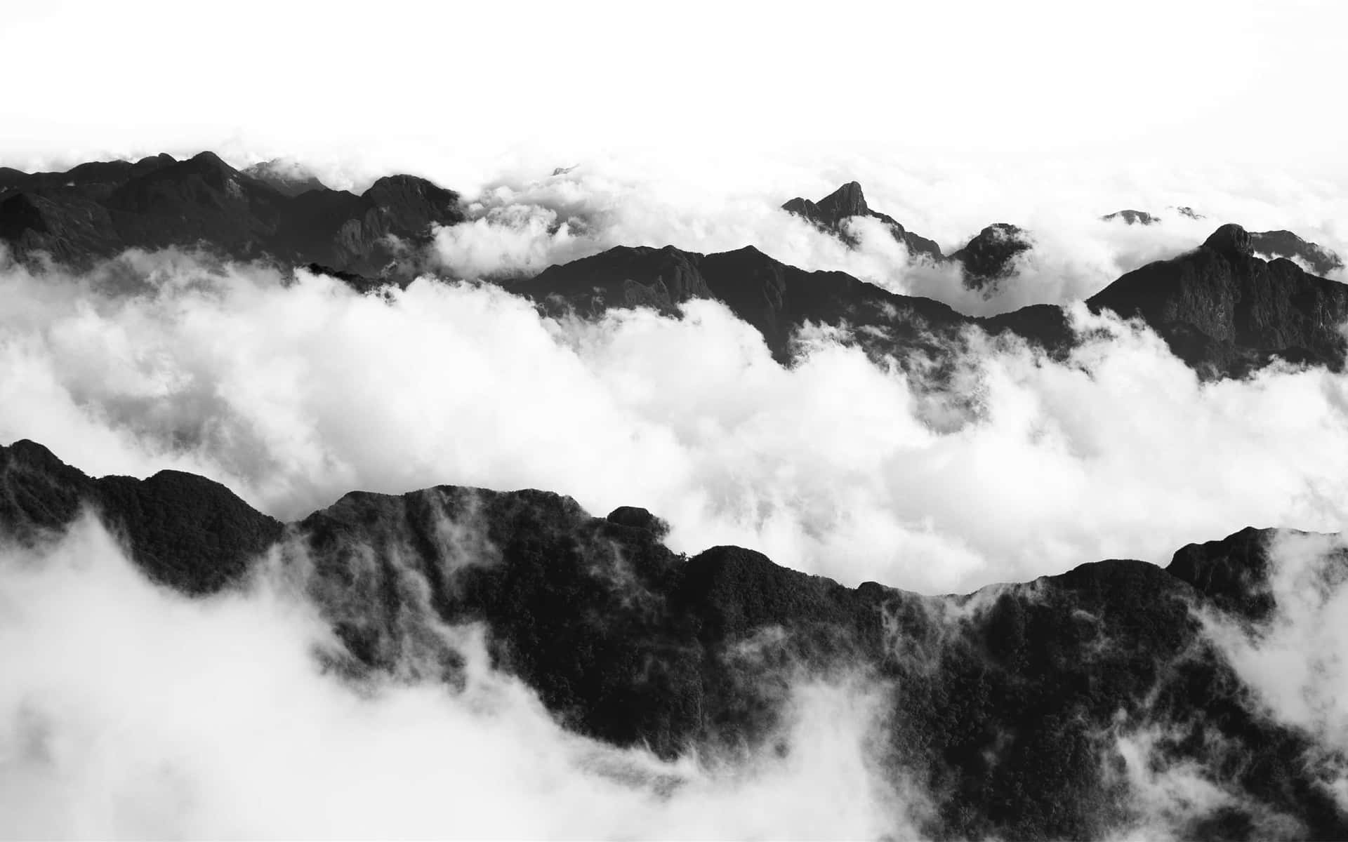 Black And White Mountains With Clouds Background