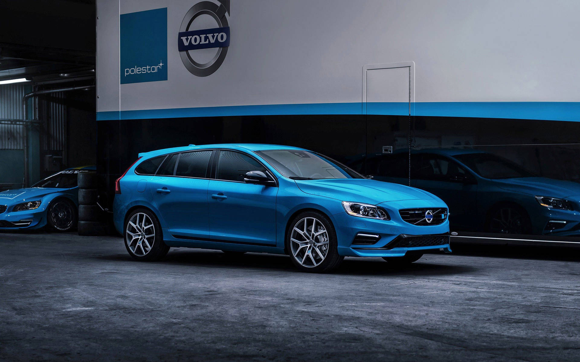 Elegance in Motion - The Blue Hatchback Volvo Car Wallpaper