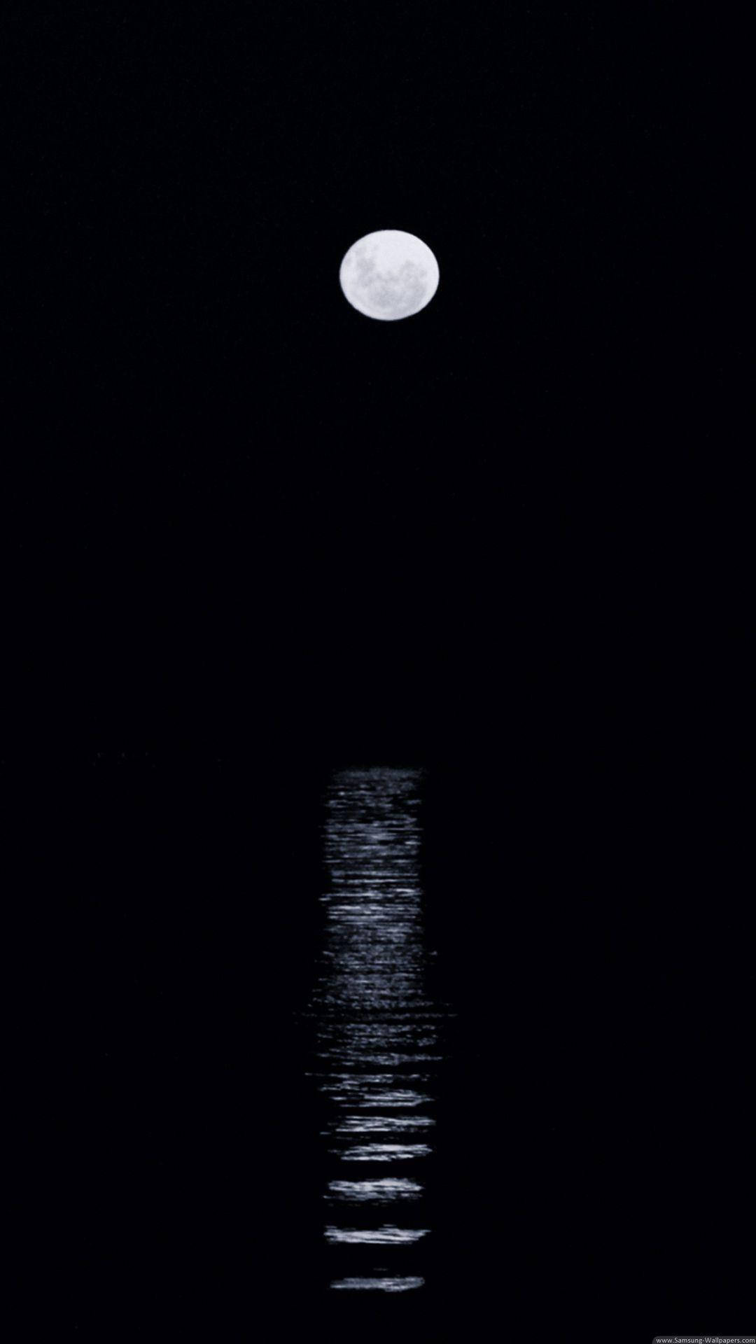 Caption: Mystical Full Moon in Dark Sky Wallpaper