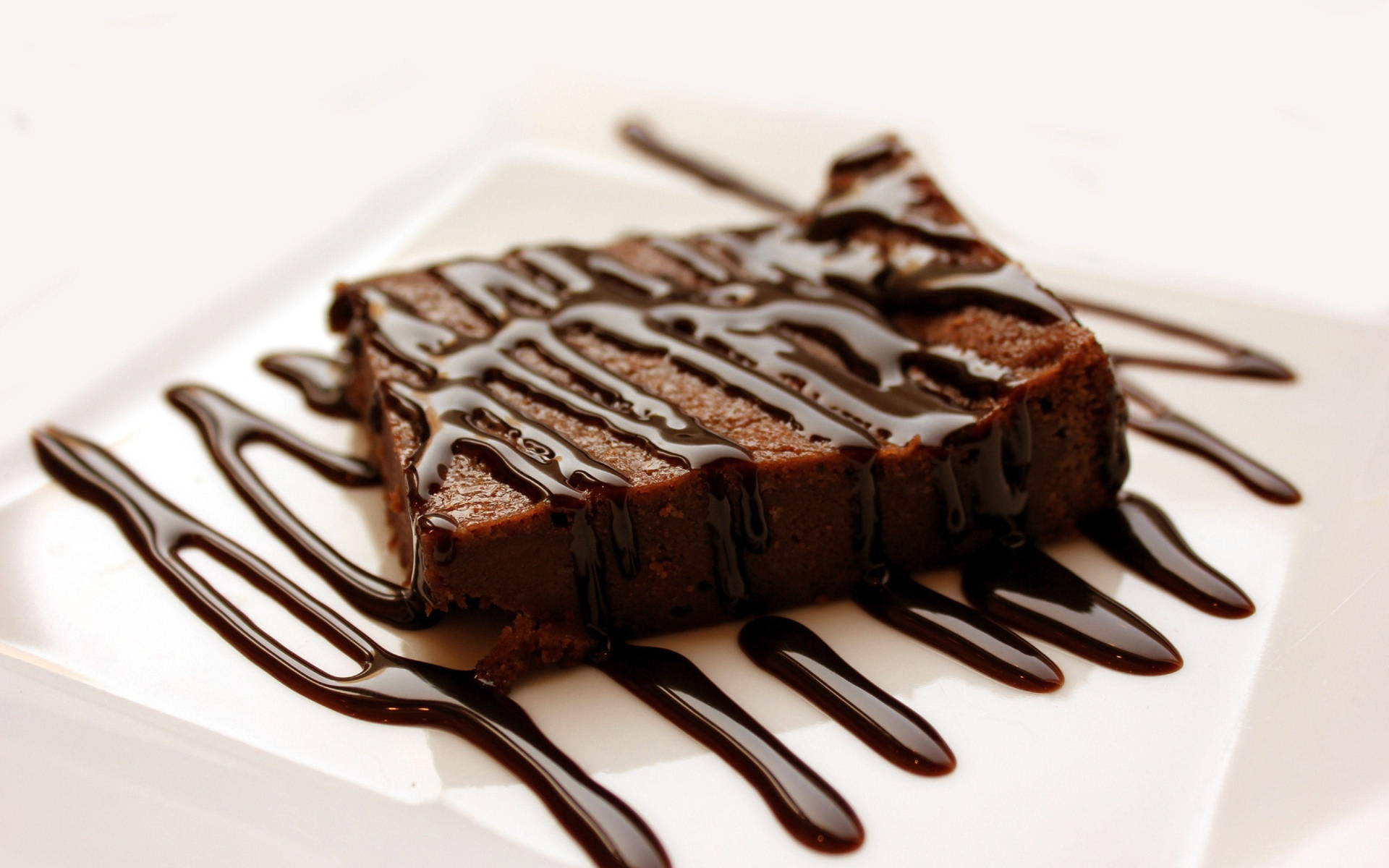 Brownie With Chocolate Drizzle Wallpaper