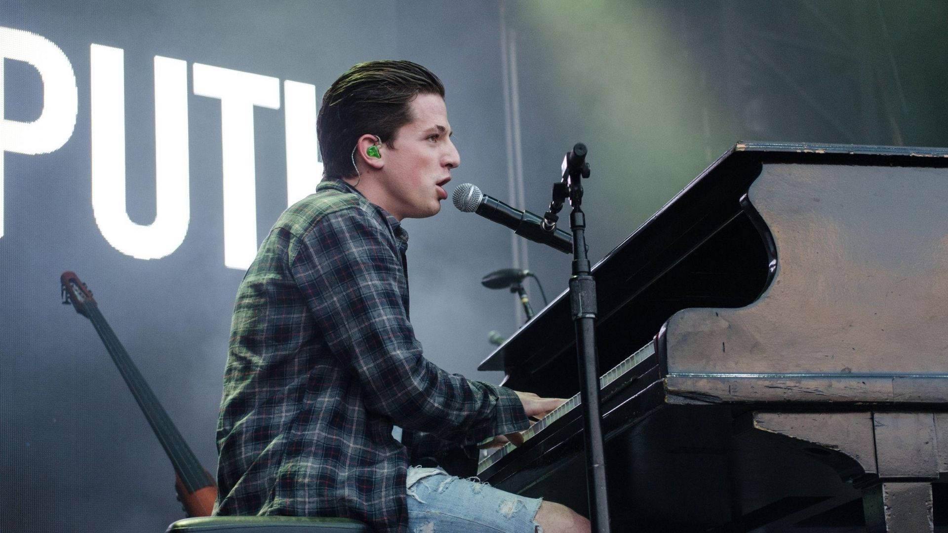 Charlie Puth Playing Piano Wallpaper