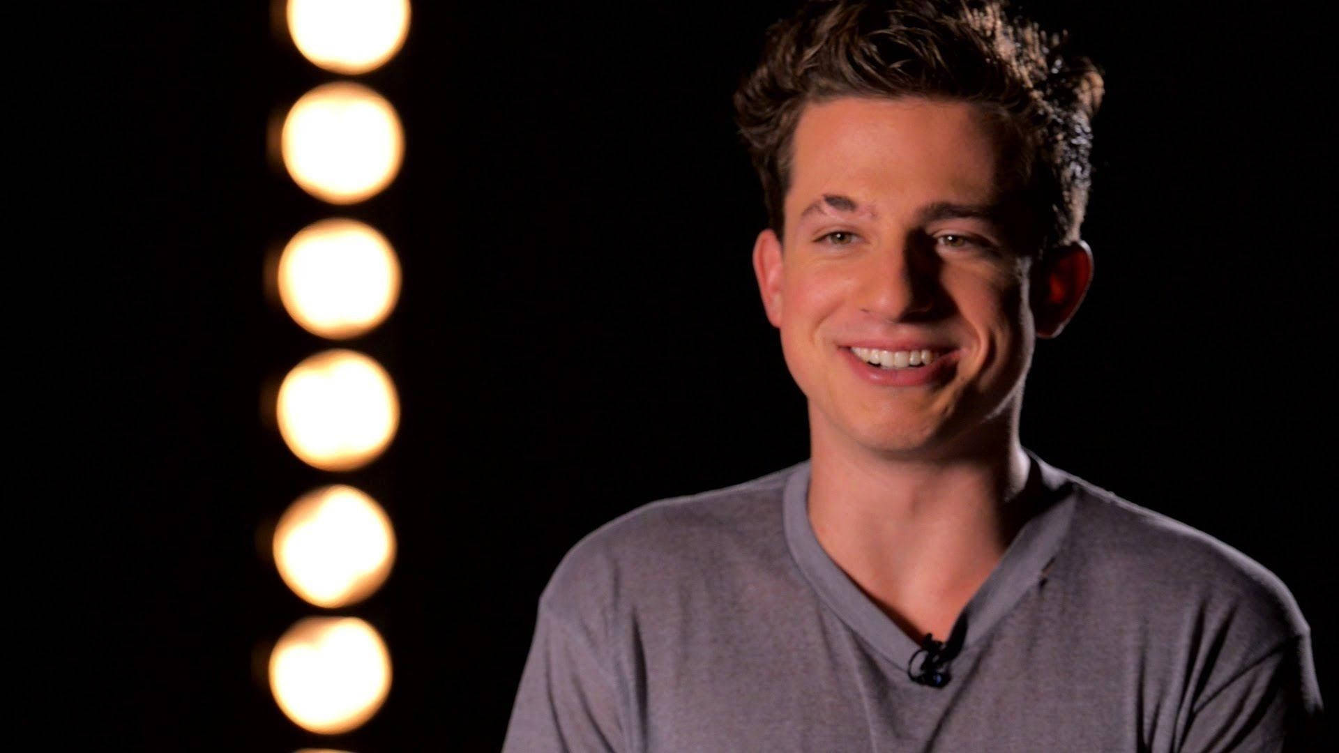 Charlie Puth With Bulbs Wallpaper