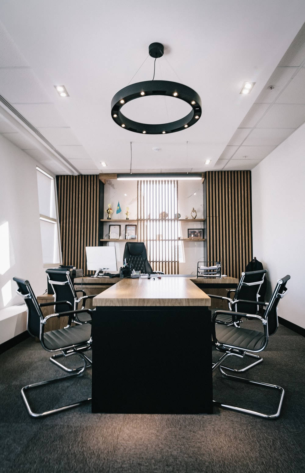 Conference Room With Black And Brown Interior Design Wallpaper