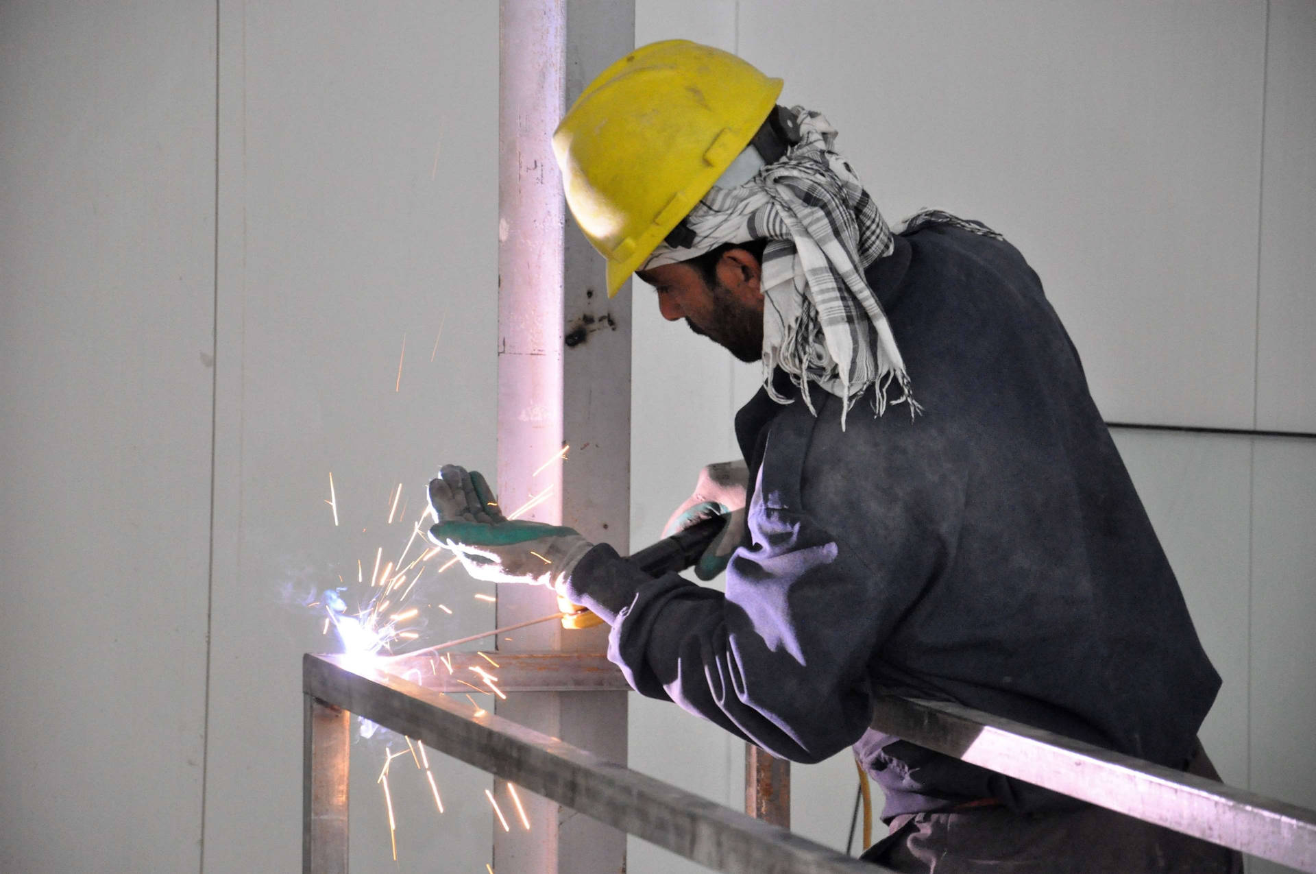 Construction Worker Welding A Steel Wallpaper