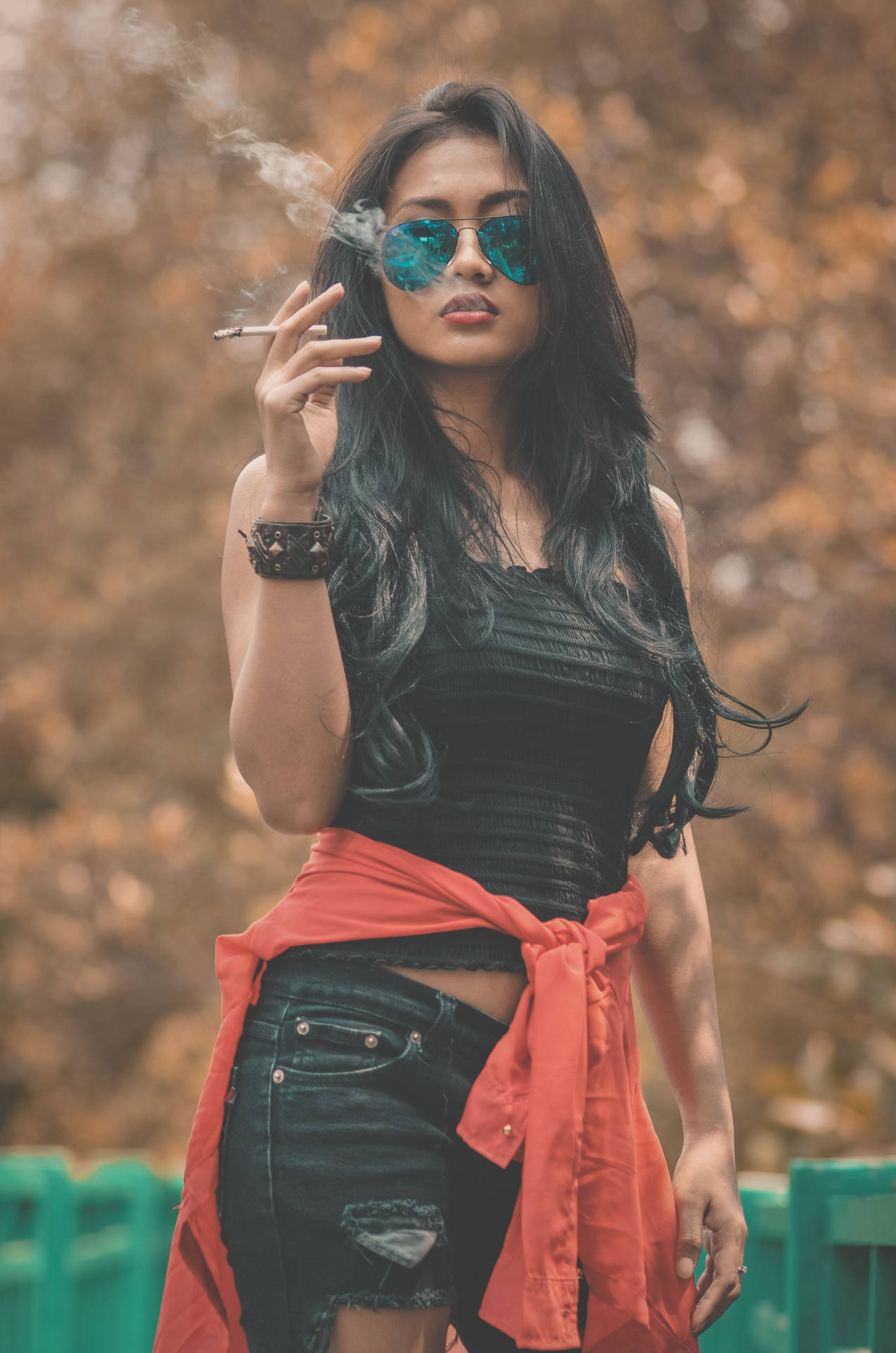 Cool Attitude Girl Smoking And Wearing Sunglasses Wallpaper