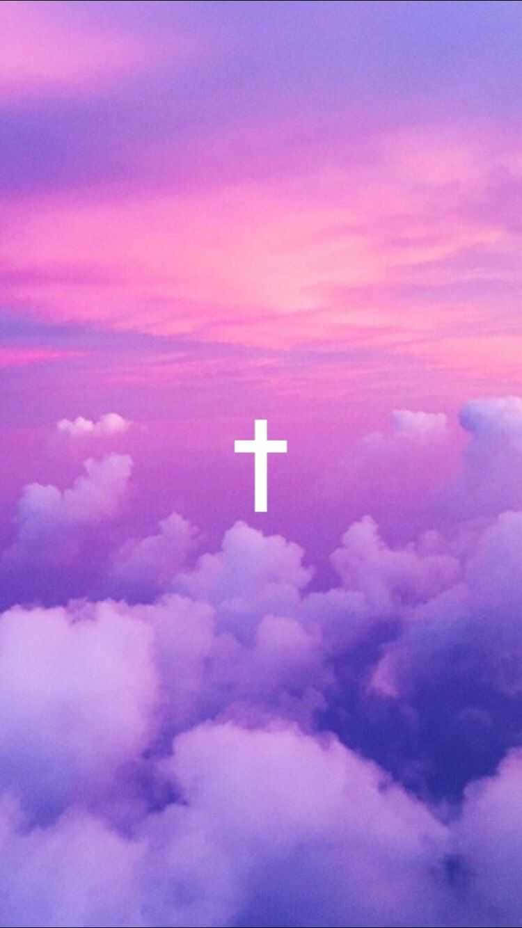 A Cross In The Sky Above The Clouds Wallpaper