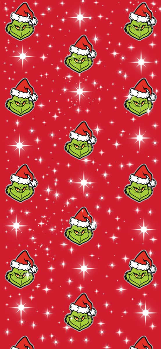 Breathe in the spirit of Christmas with this cheery Cute Grinch. Wallpaper