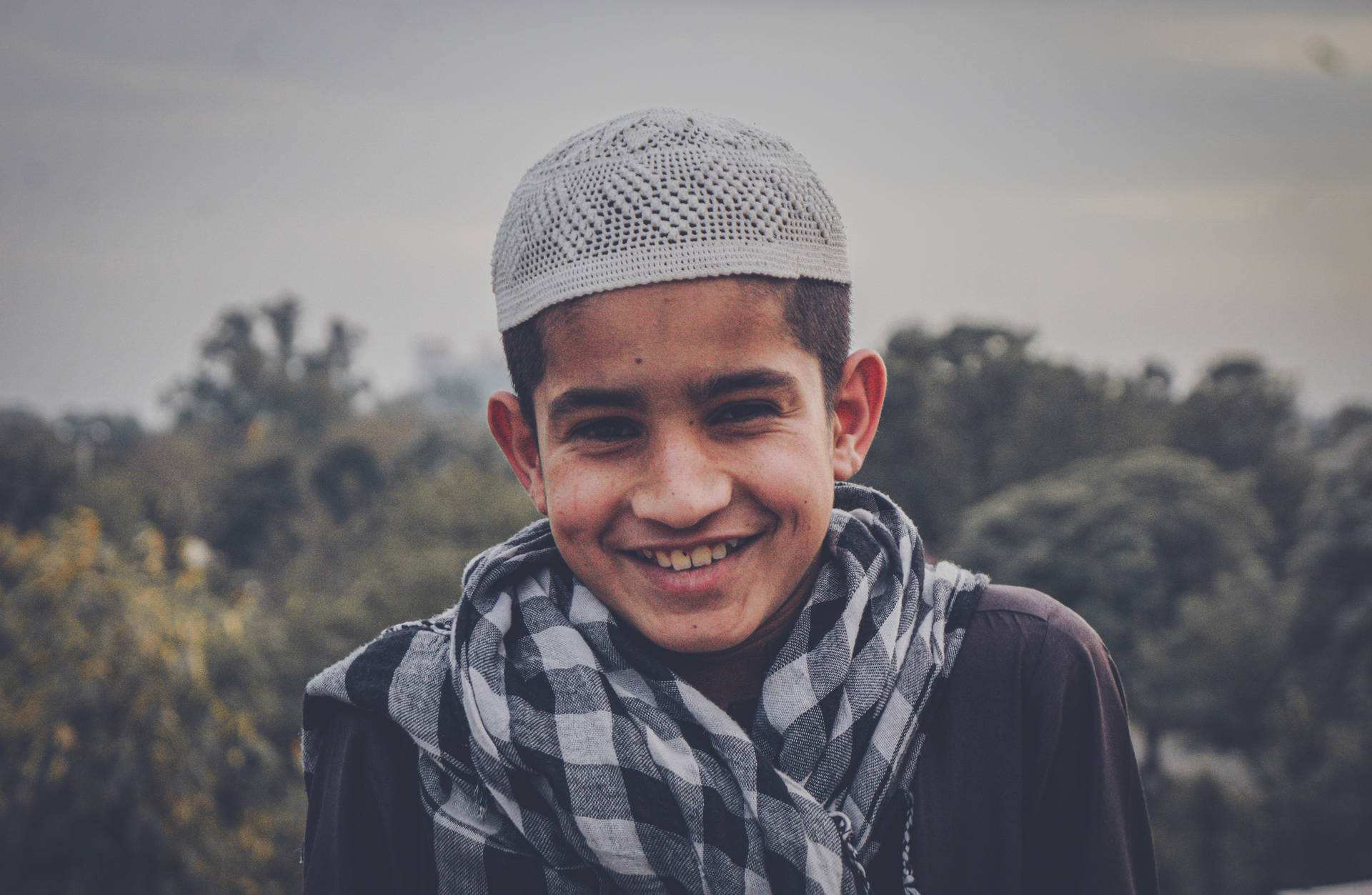 "An adorable smile of a Muslim boy" Wallpaper