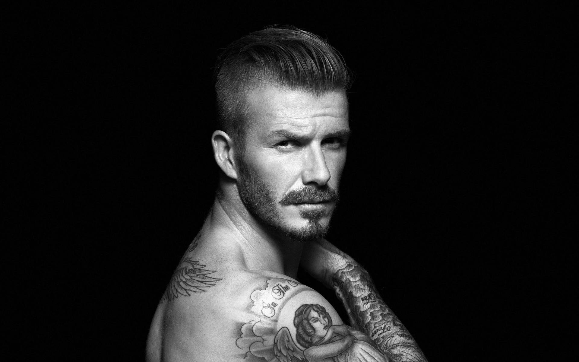 David Beckham shows off his impressive collection of tattoos Wallpaper