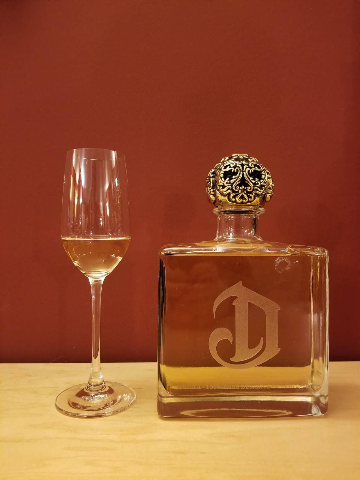 Deleón Tequila With A Wine Glass Wallpaper