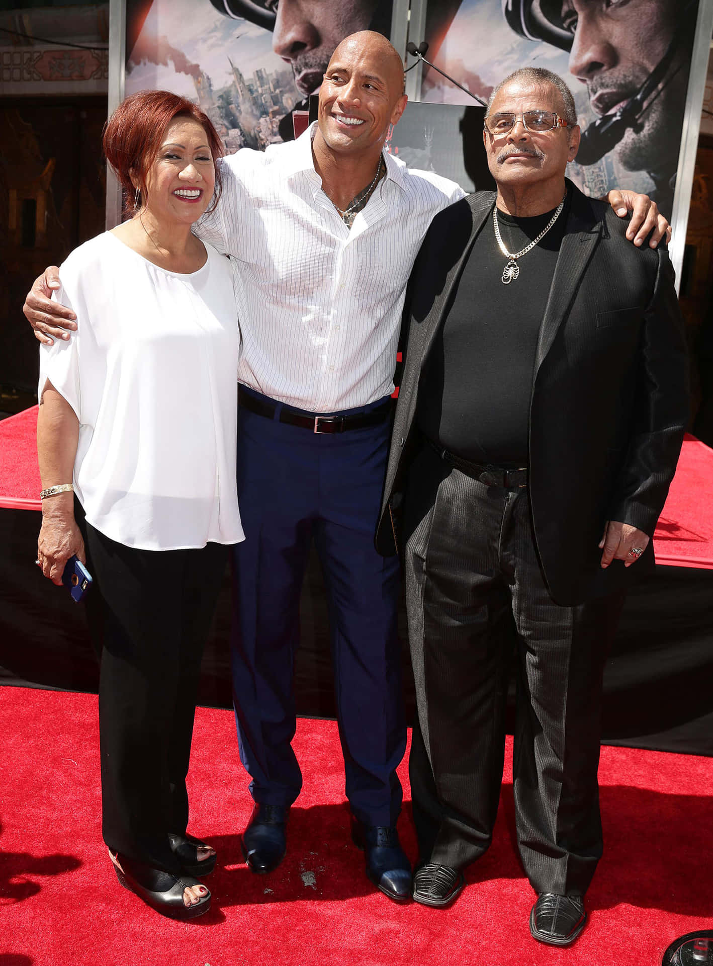 Dwayne Johnson With Parents Ata And Rocky Johnson Wallpaper