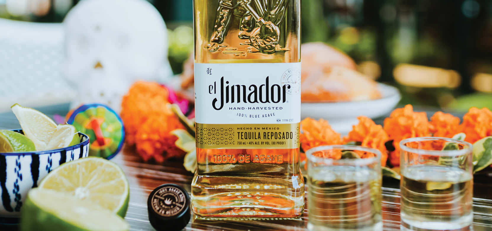 A masterful close-up shot of El Jimador Reposado's tequila bottle. Wallpaper