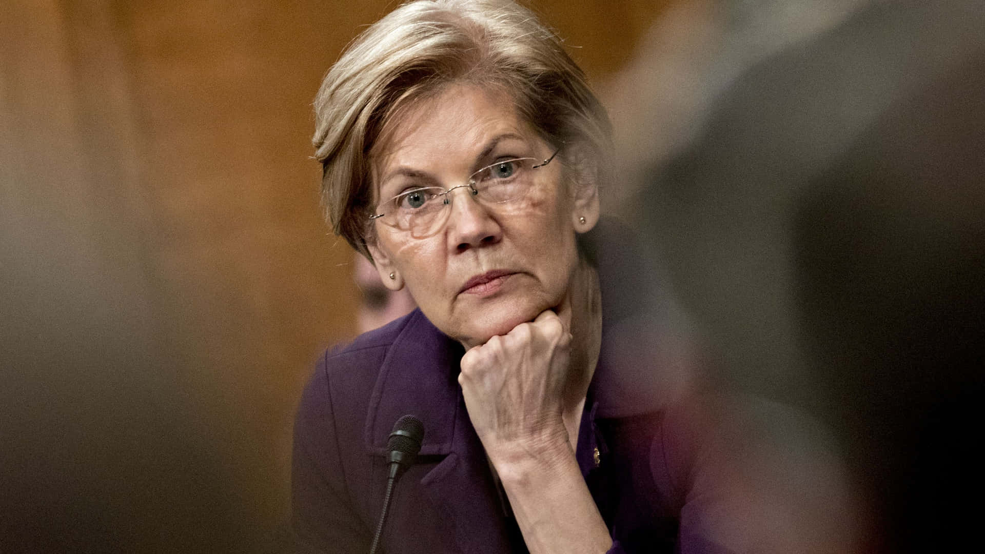 Elizabeth Warren Contemplating with Fist on Chin Wallpaper