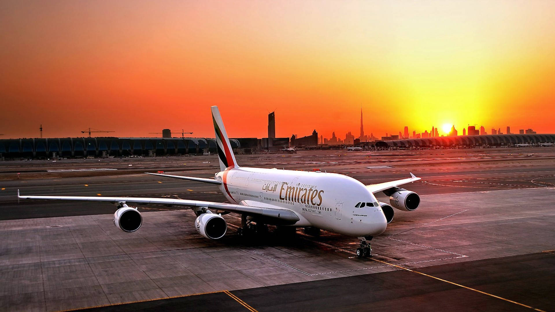 Emirates Airplane At The Airport Wallpaper