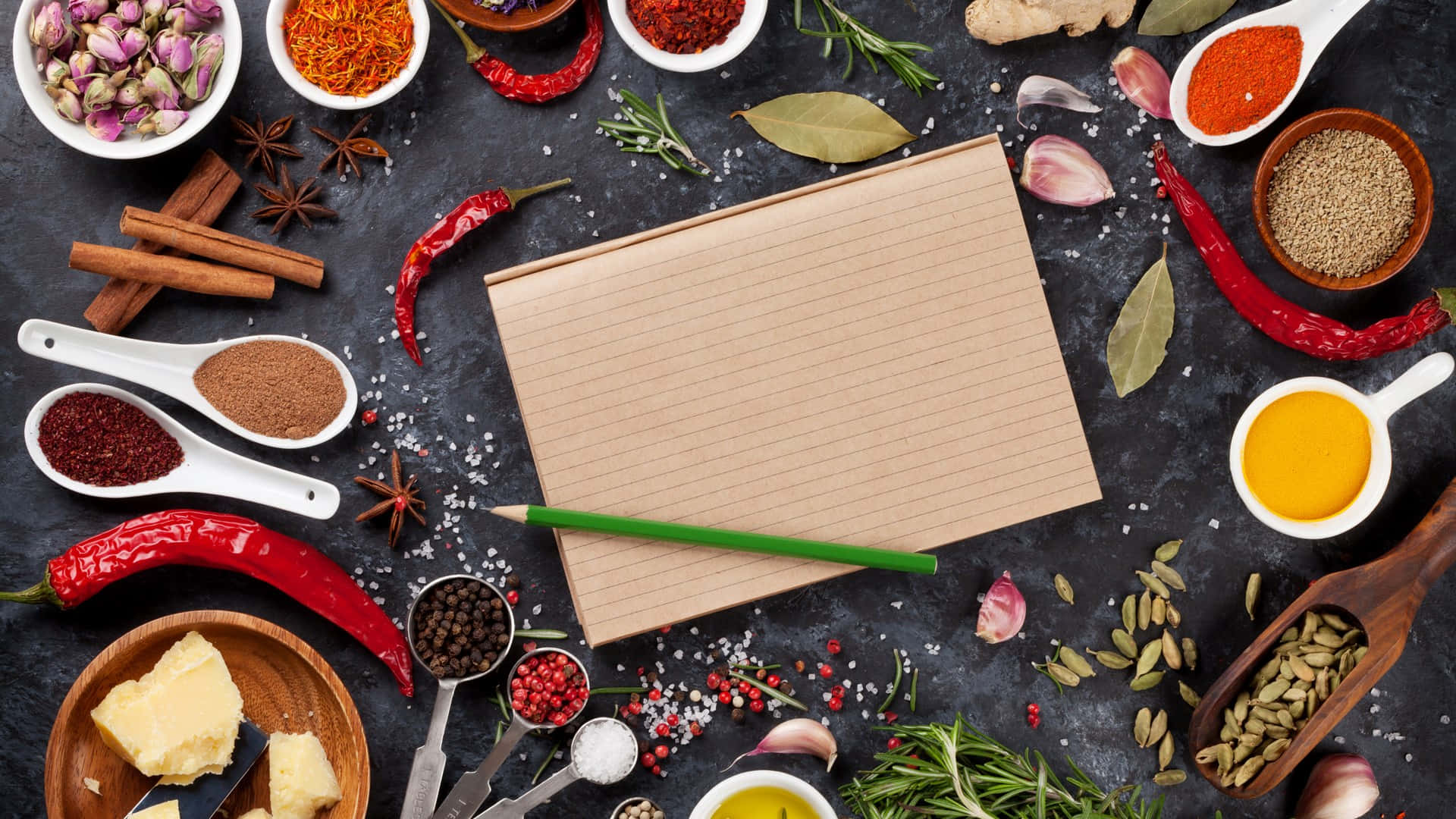 Essential Cooking Spices With Pen And Paper On Table Wallpaper