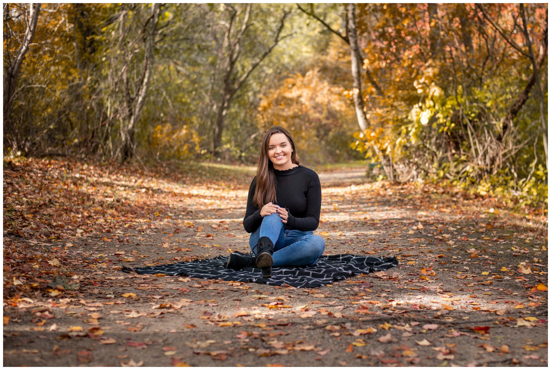 Laughing with joy during Fall Senior Pictures
