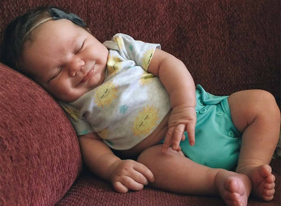 Funny Sleeping Smiling Baby Picture