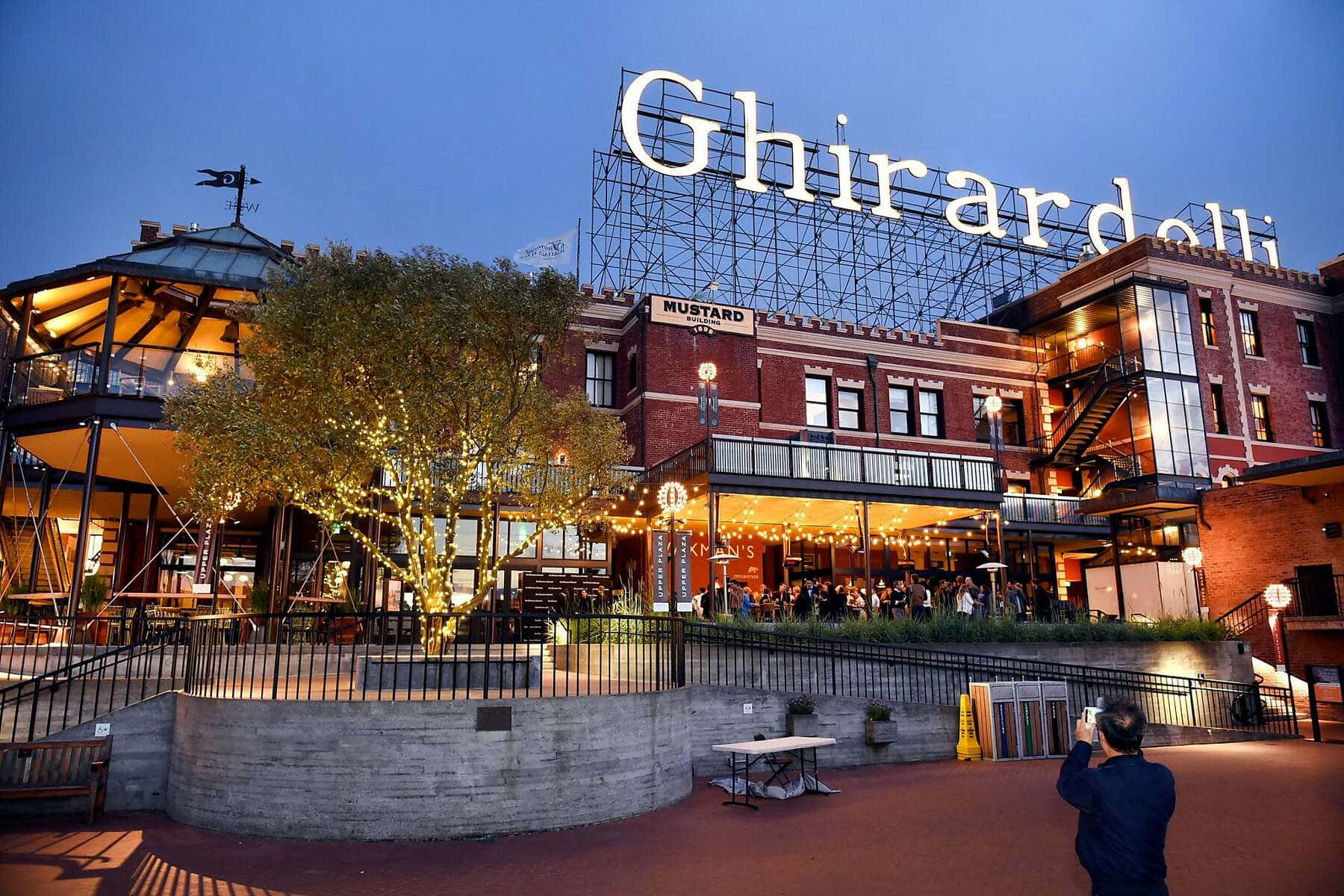 "Iconic Ghirardelli Square Under Blue Afternoon Sky" Wallpaper