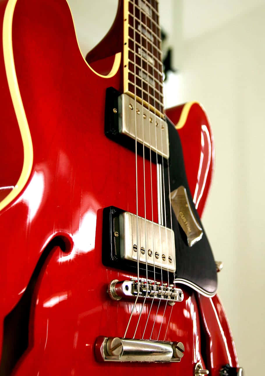 Glossy Red Gibson 335 Wallpaper