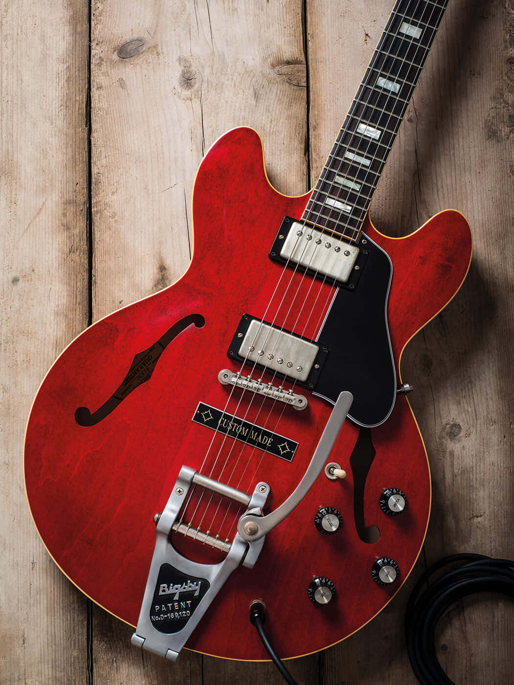 Gibson 335 On Wooden Surface Wallpaper