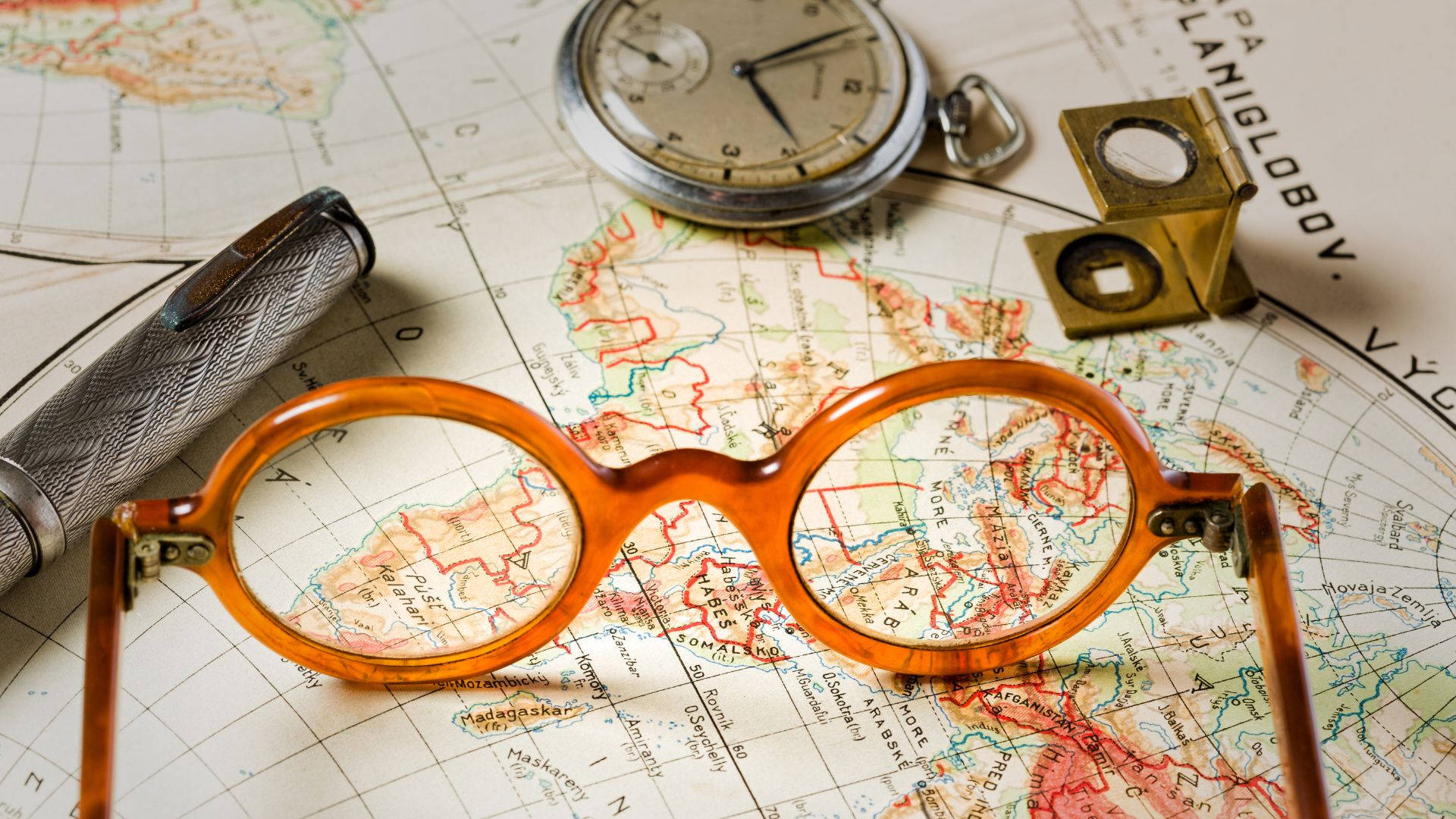 Glasses And Map History Wallpaper