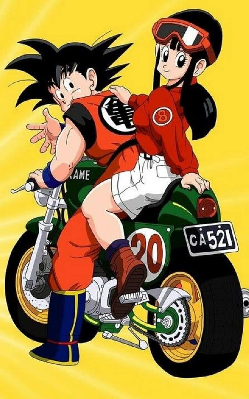 Goku And Chichi Riding A Motorcycle Wallpaper