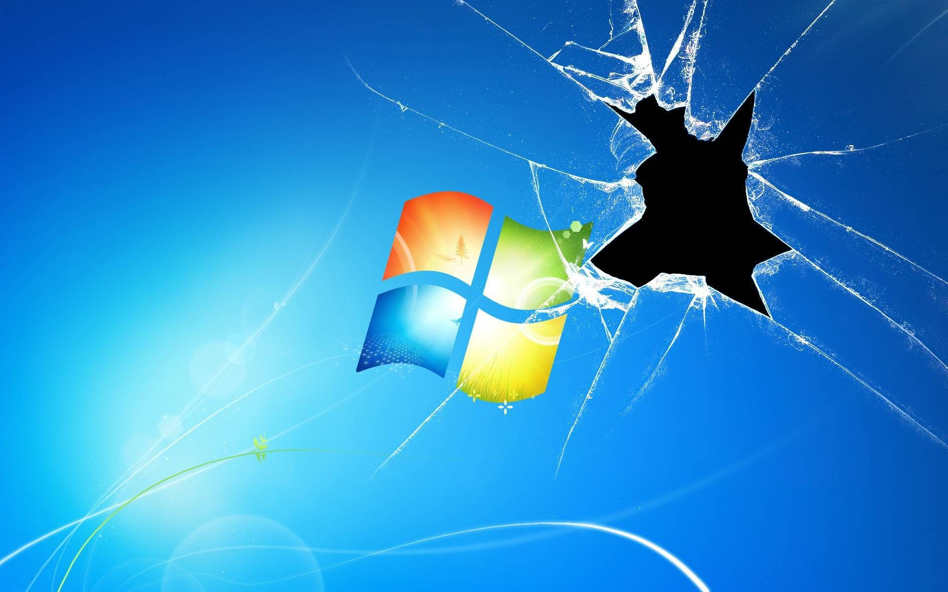 Shattered glass from a broken computer screen Wallpaper