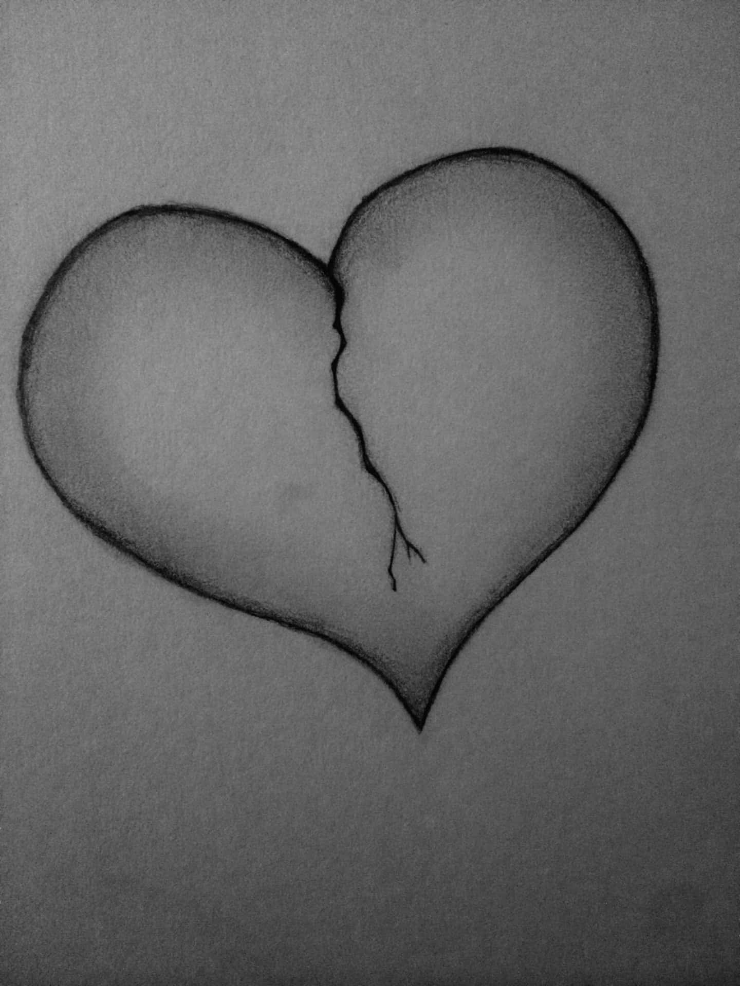 A Black And White Drawing Of A Broken Heart