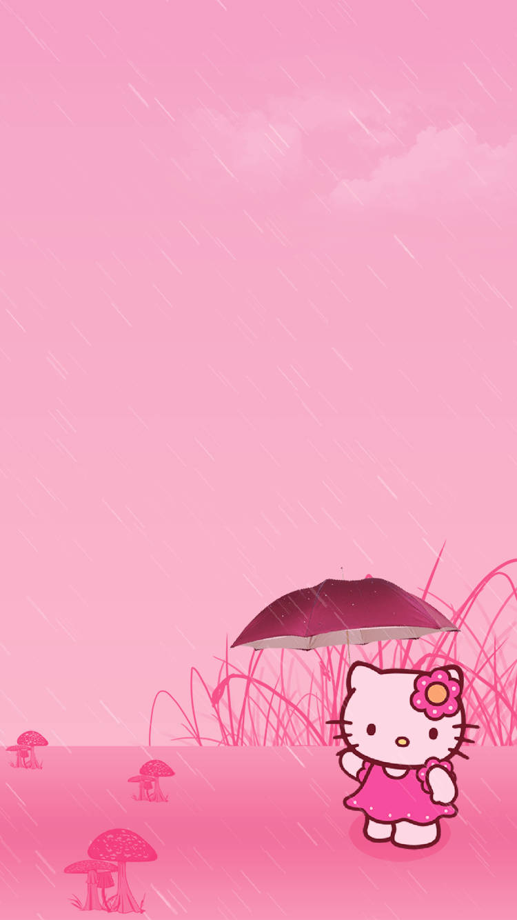 Embrace the Rainy Days with Hello Kitty's Cute Pink Umbrella Wallpaper