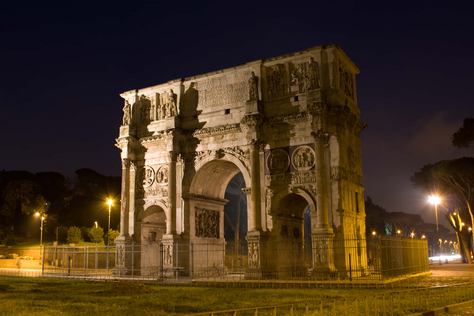Historic Arch Of Constantine At Night Wallpaper