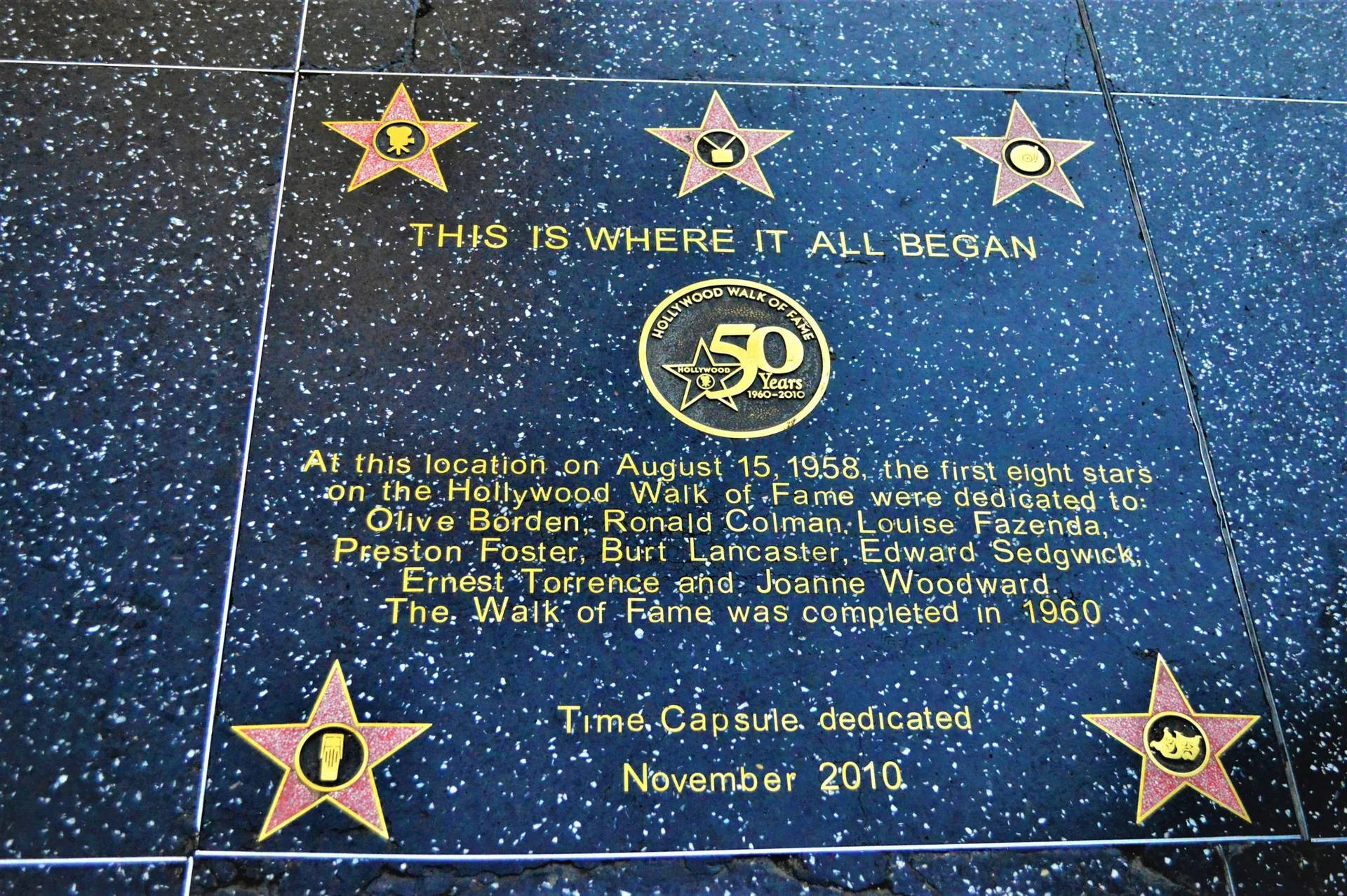 Caption: A Close up of a Hollywood Walk of Fame Inscription Wallpaper