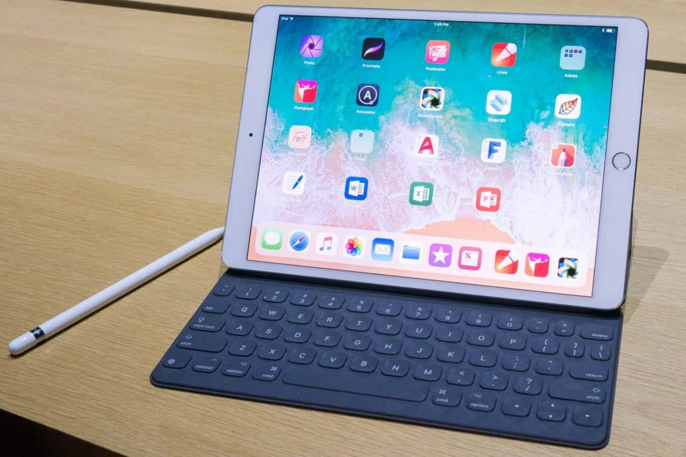 An Apple Ipad Pro With A Keyboard And Pen