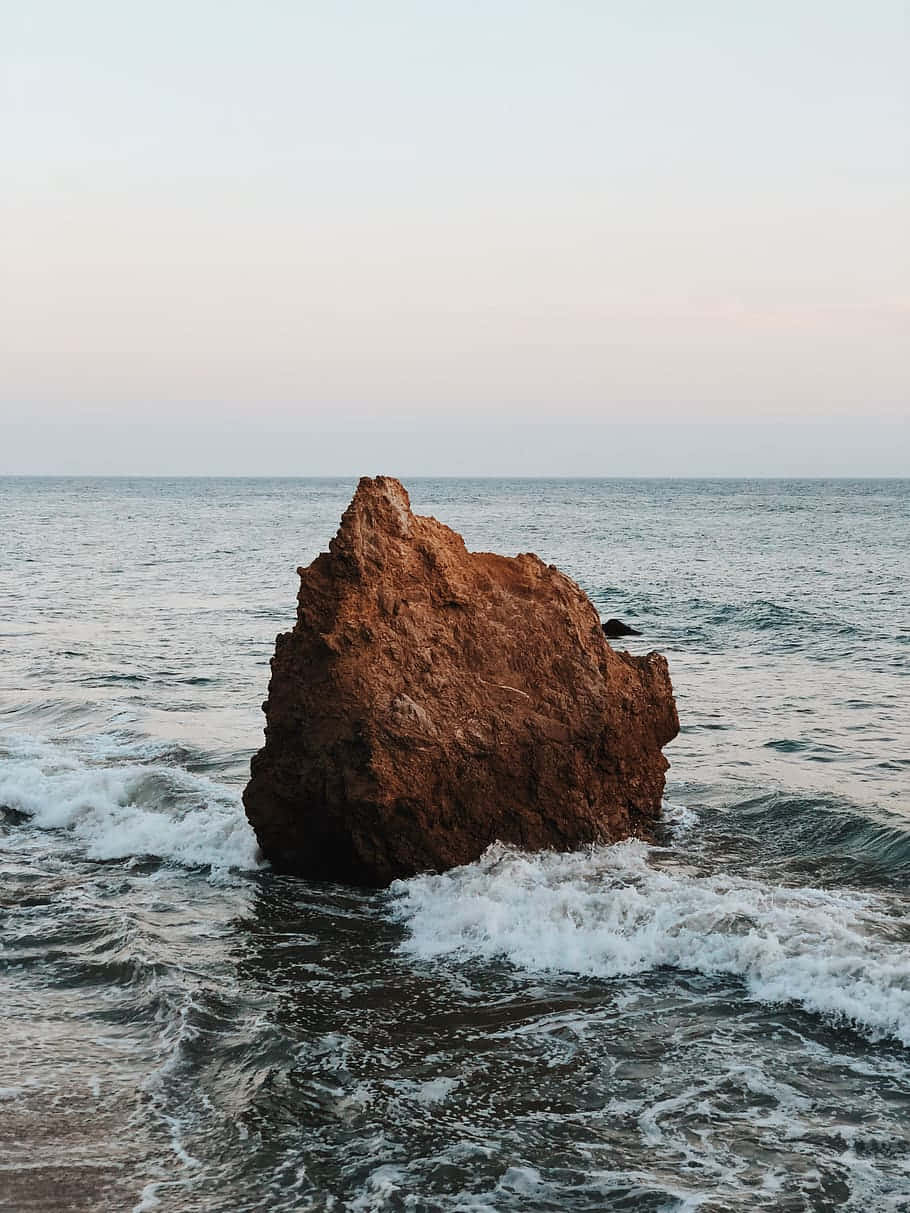 Iphone X Malibu Background With Big Stone