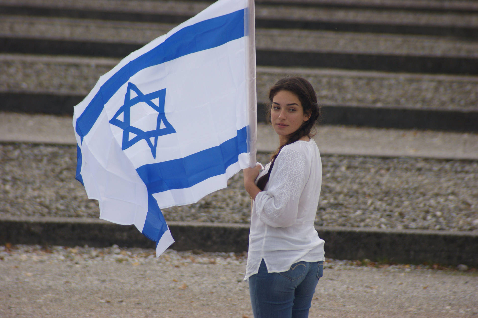 A patriotic display with an Israeli lady and the Israel flag. Wallpaper