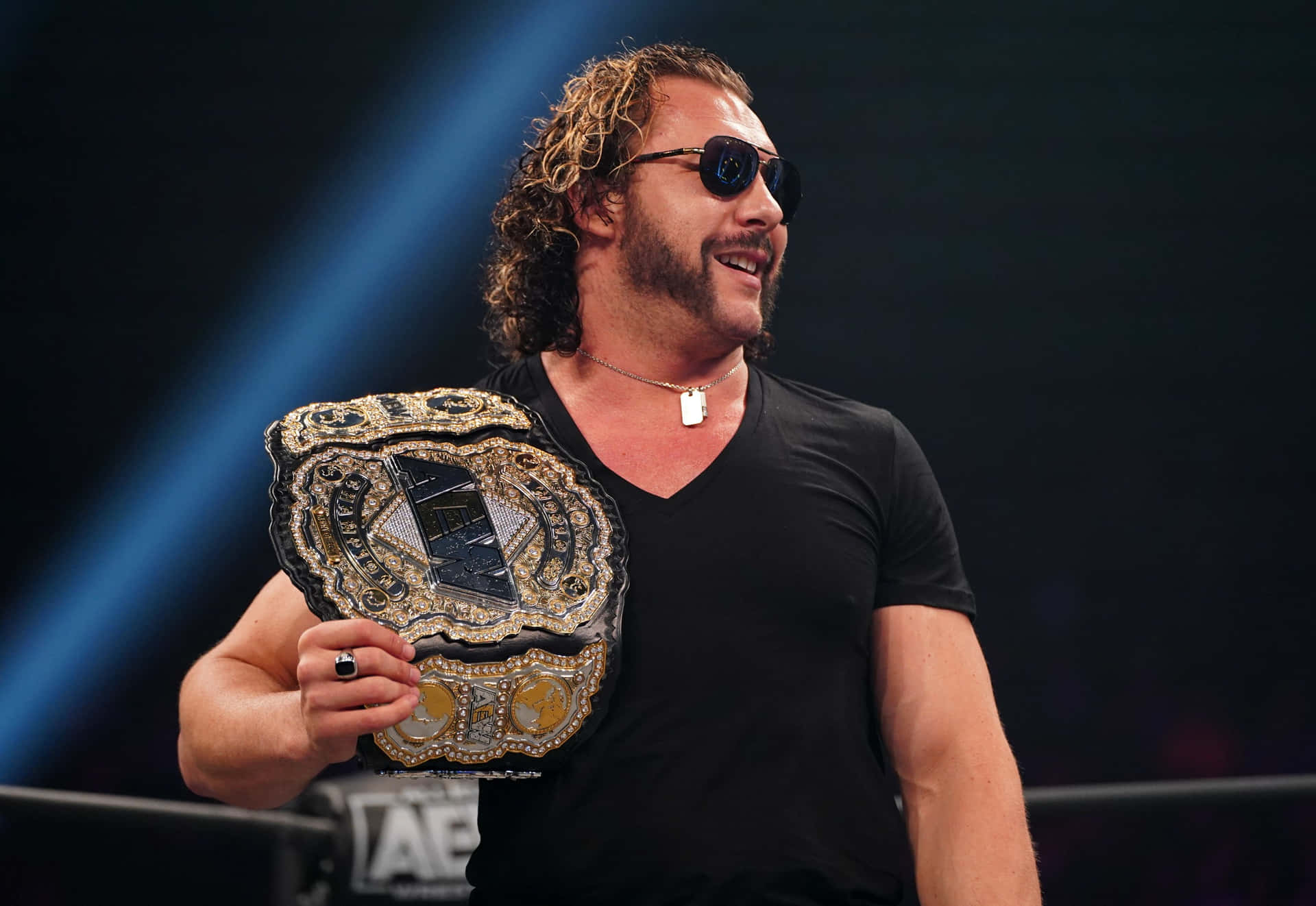 Kenny Omega With Championship Belt Wallpaper