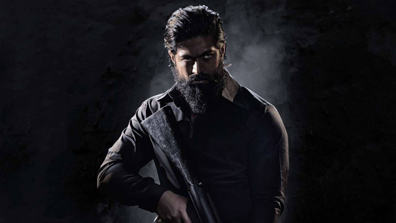 Intense Rocky Bhai Holding Rifle in KGF Chapter 2 Wallpaper