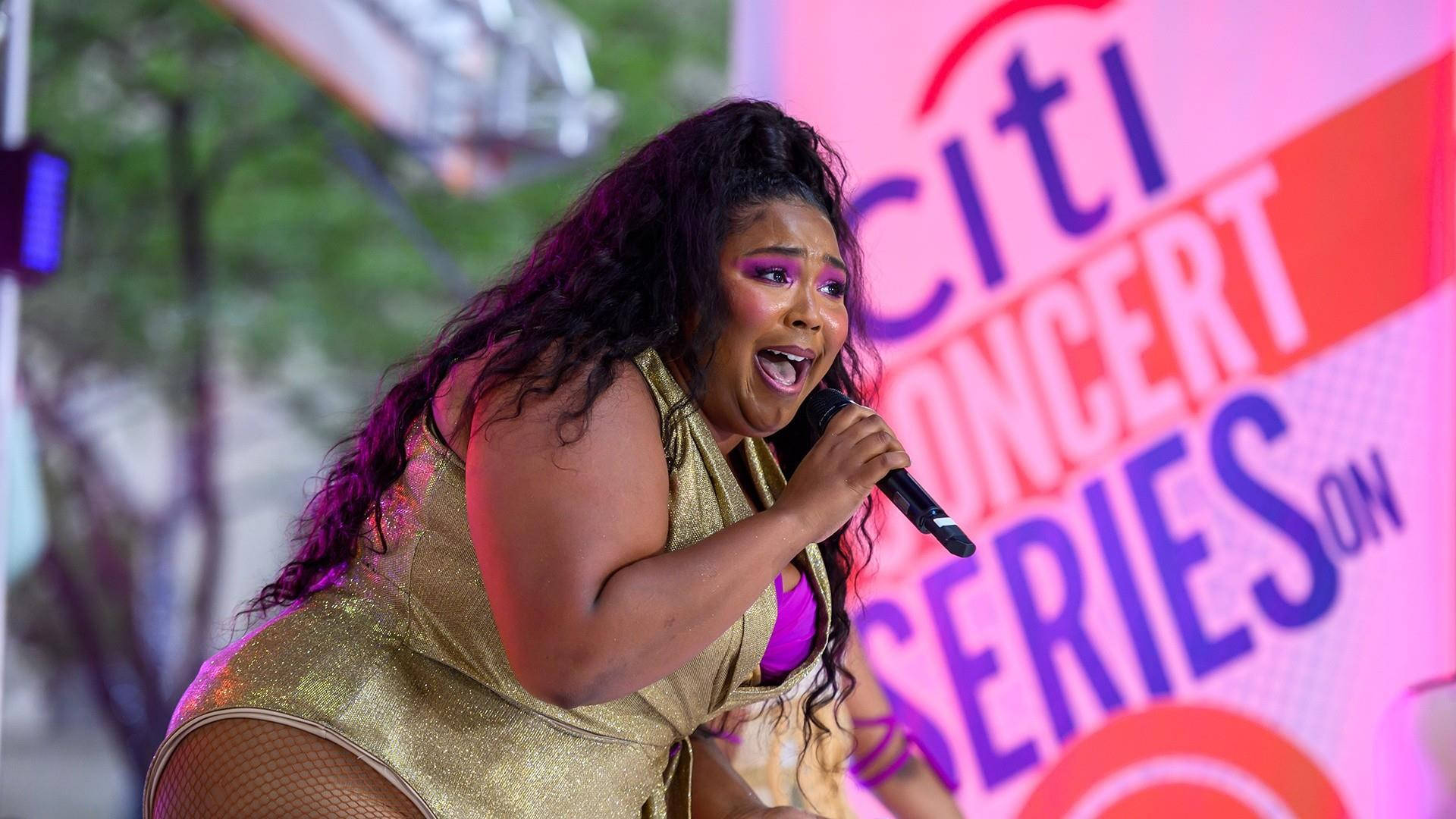 Lizzo In One-Piece Suit Wallpaper