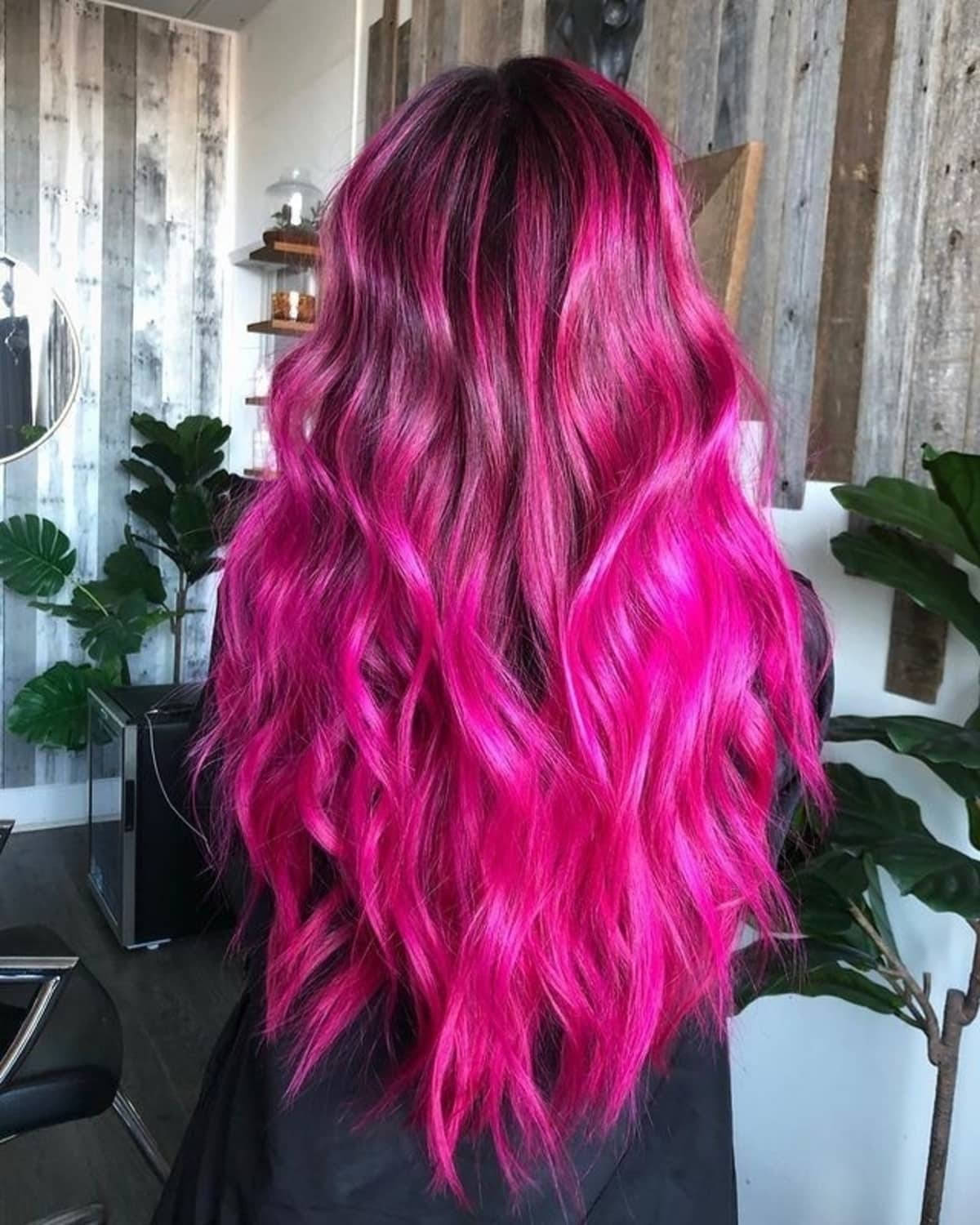 Caption: Vibrant Magenta Hair Waves Wallpaper