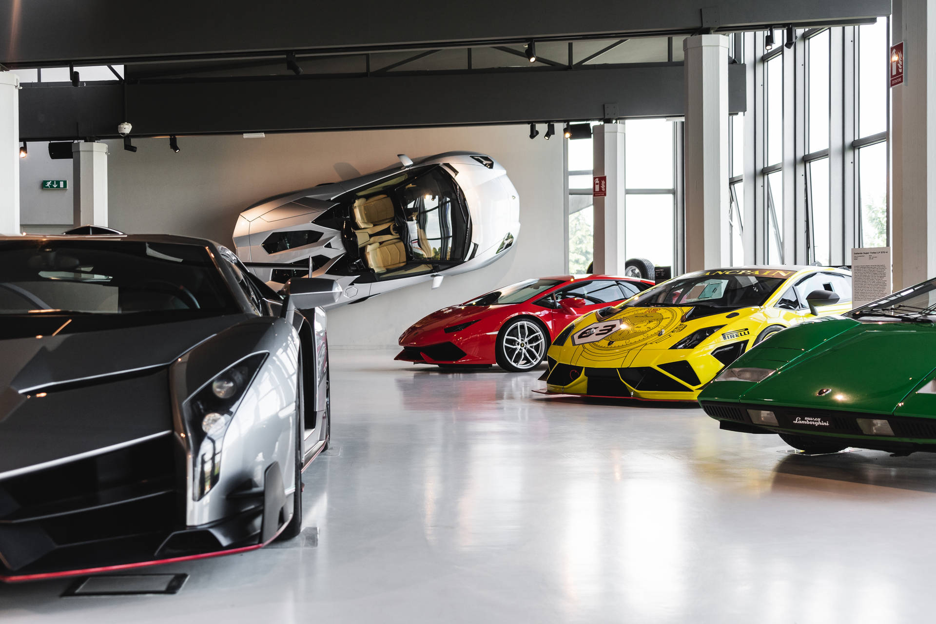 An Exclusive Look into the Luxury Car Museum Wallpaper