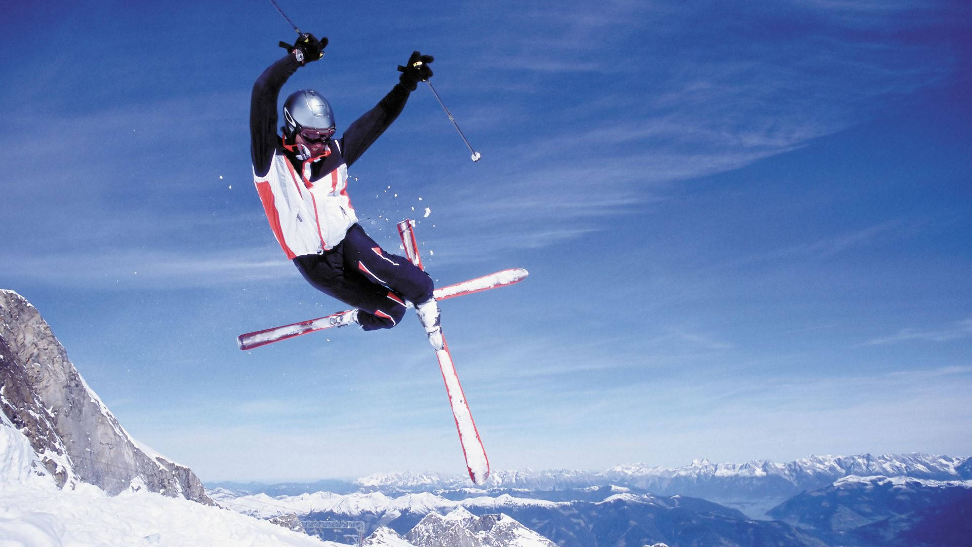 Thrilling Ski-jump Mid-air Action Wallpaper