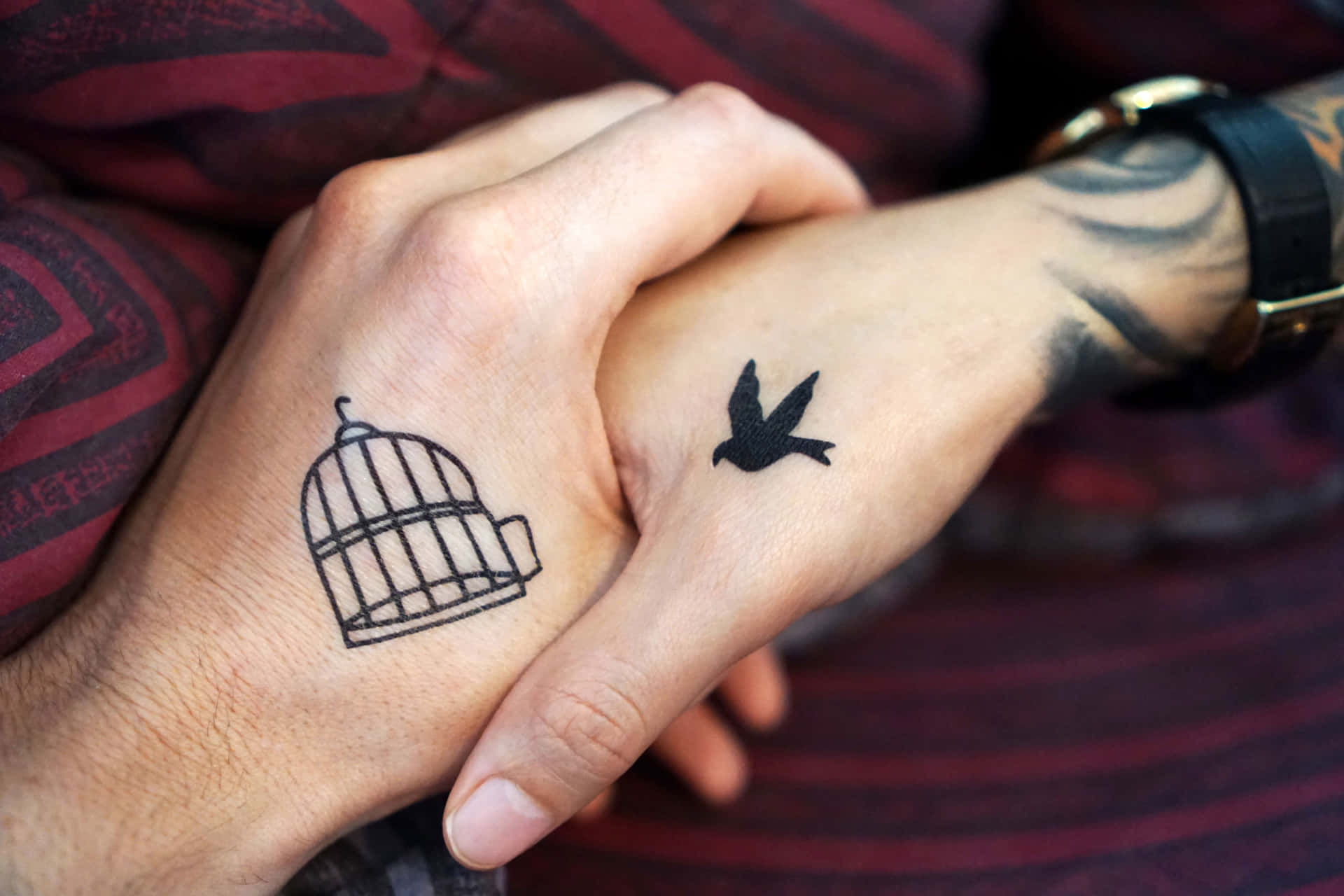 Meaningful Couple Hand Tattoo In Black Wallpaper