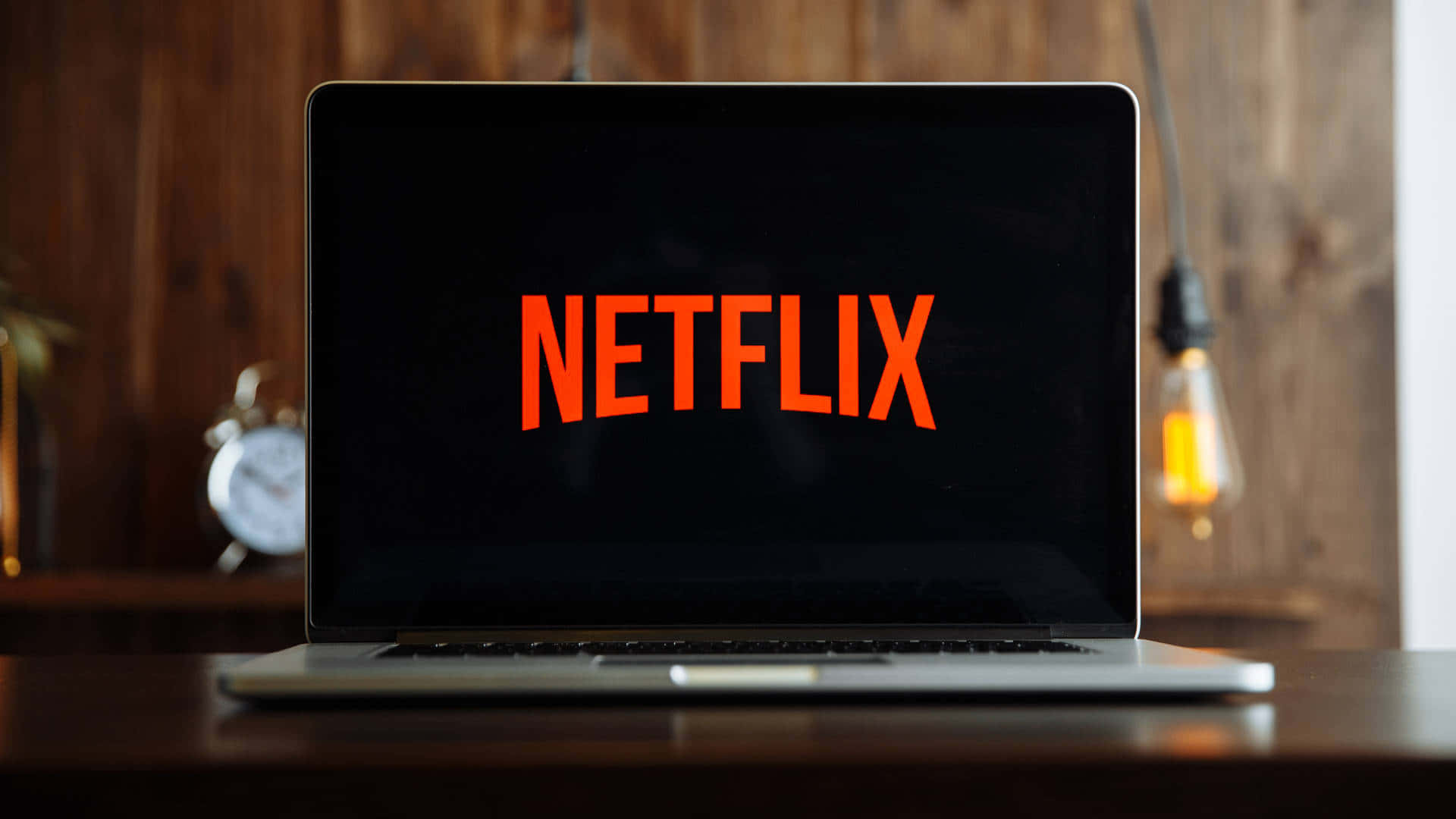 Netflix App Logo On Laptop Background
