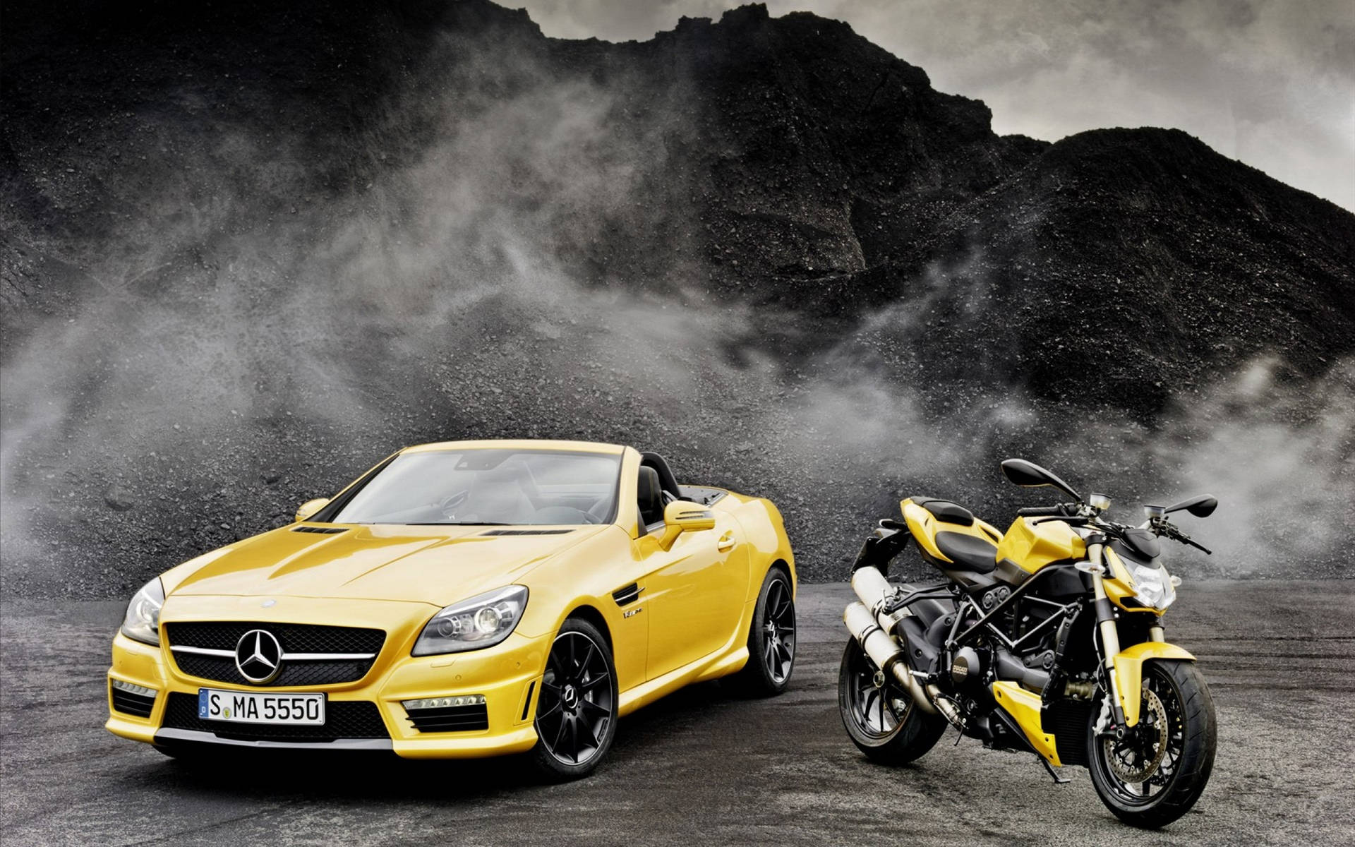 Caption: Elegance in Motion: Yellow Convertible Luxury Car Wallpaper